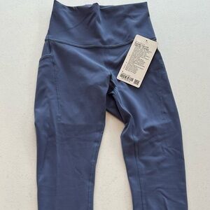 Lululemon Wunder Train HR Tight 25” with Pockets. Size 4. NWT. Blue (Oasis blue)